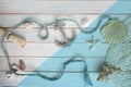 Sea Ã¢â¬â¹Ã¢â¬â¹shells, anchor, blue cord, white fishing net, starfish, pebbles, still life, summer vacation concept, trip to warm